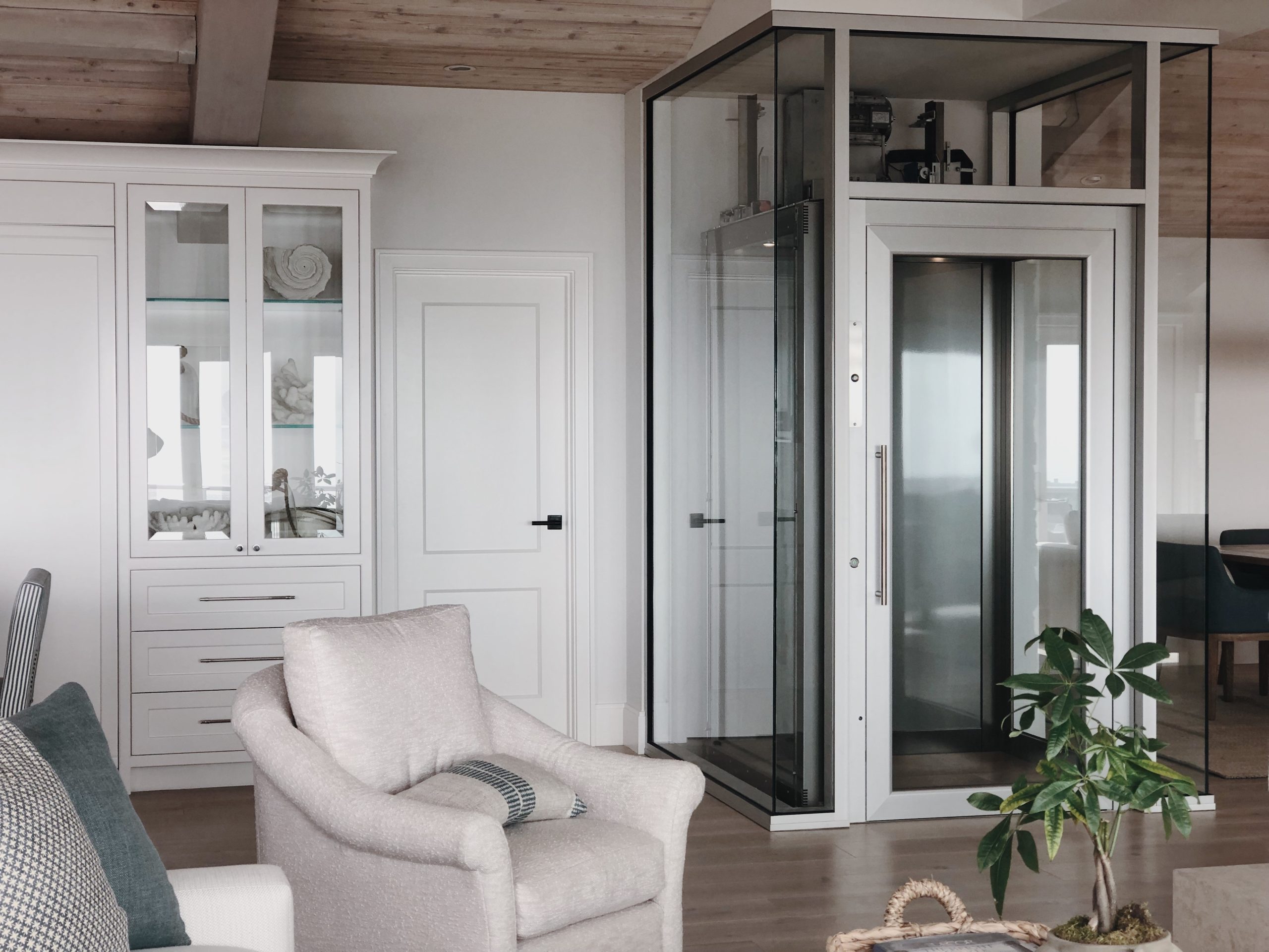 Elevator Boutique glass shaft home elevator in Emerald Bay, Laguna Beach