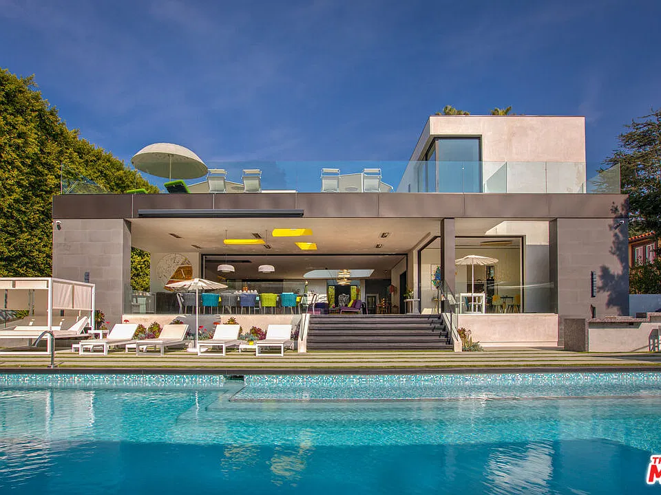 Mirrored Modern, Beverly Hills Elevator Boutique 3-level home elevator with panoramic glass swing doors in a modern Beverly Hills mansion